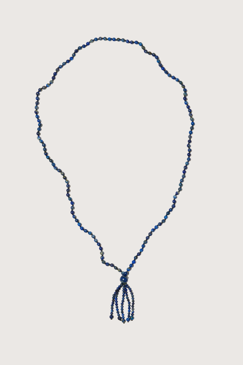 flat lay Cobalt Tassel Necklace Round blue lapis beads
Softly draped tassel
Can be worn long or layered
Necklace length 80cm
Tassel length 10cm