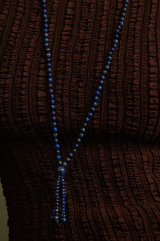 model wearing Cobalt Tassel Necklace Round blue lapis beads
Softly draped tassel
Can be worn long or layered
Necklace length 80cm
Tassel length 10cm