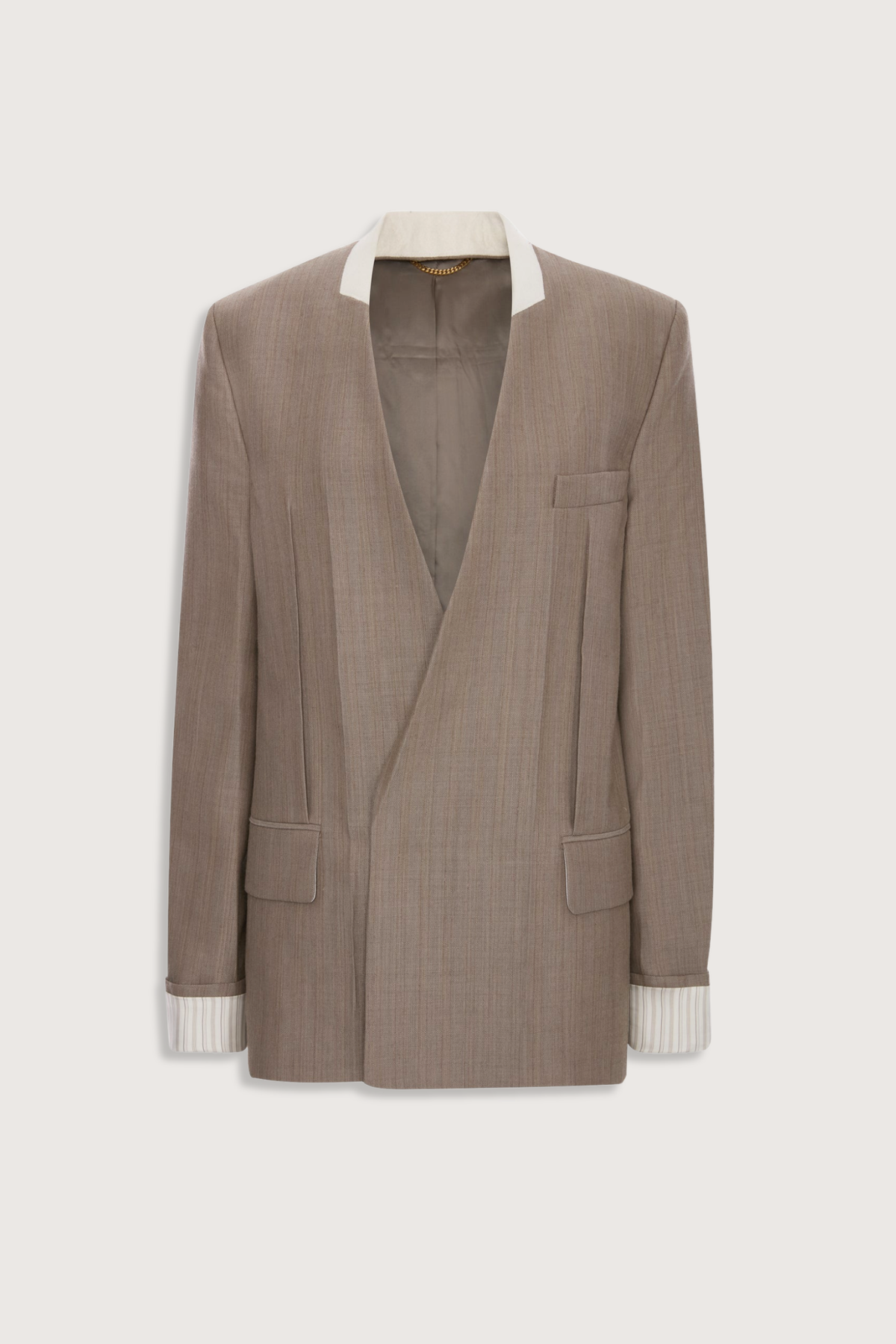 flat lay Collarless Jacket limestone Seat length
Half double breasted
Collarless
Long sleeve
Oversized shoulder
Laundry press
Flap pocket
Full lining
100% Wool