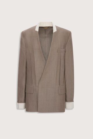 flat lay Collarless Jacket limestone Seat length
Half double breasted
Collarless
Long sleeve
Oversized shoulder
Laundry press
Flap pocket
Full lining
100% Wool