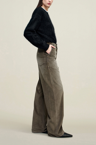 side profile model wearing Column Leg Corduroy Jean mink distressed brown Mid-high rise fit, Long wide leg, Subtle sculptural curve