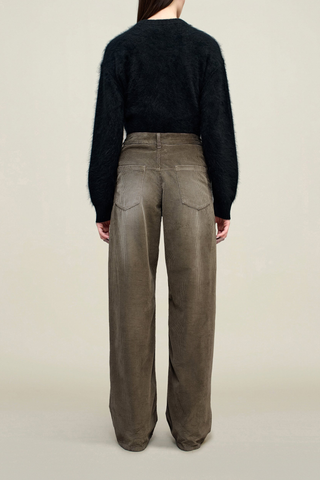 back profile model wearing Column Leg Corduroy Jean mink distressed brown Mid-high rise fit, Long wide leg, Subtle sculptural curve