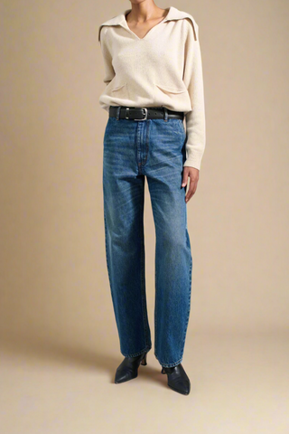 front profile model wearing wide Column Leg Jean