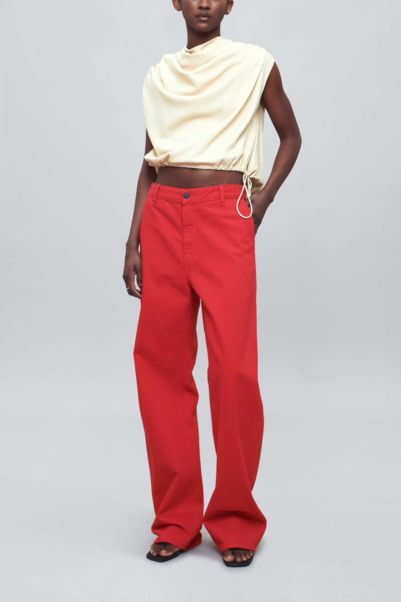 front profile model wearing Column Leg Jeans red Wide Leg
Red cotton denim
Mid-high rise
Relaxed through hip and thigh
Subtle sculptural curve
Deep side seam slant pockets and back pockets
Belt loops