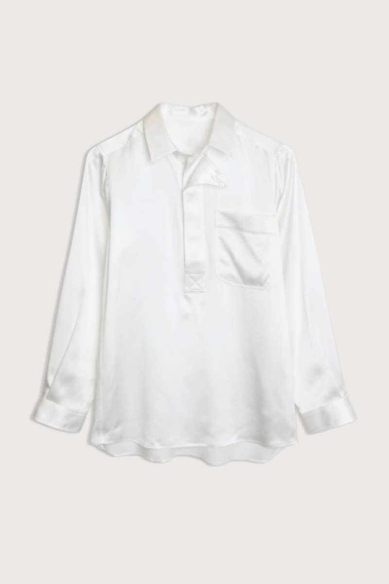 flat lay Combat Polo Silk Shirt ecru Serge trim
Pullover style
Asymmetric design
Utilitarian feel
Chest pocket
Straight cut - relaxed fit
Square collar&nbsp;
Square cuff
Mother-of-pearl buttons