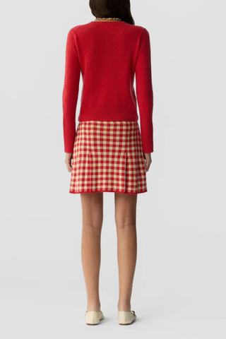 back profile model wearing Compass Jane Cardigan scarlet red LIGHT-WEIGHT POPCORN STITCH CARDIGAN
HIGH CUFF RIB TRIM AT SLEEVE
RIB HEM TRIM
JERSEY TUBULAR NECK TRIM
FRONT BUTTON CLOSURE
GIR BRANDING AT BACK NECK
100% CASHMERE