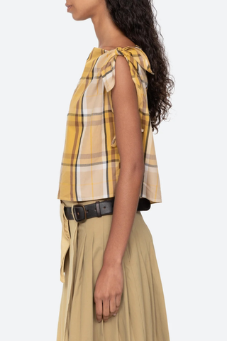 side profile model wearing  Copeland Top yellow plaid cotton Plaid pattern top
Relaxed
Slightly cropped silhouette
Ties at the shoulders and sides