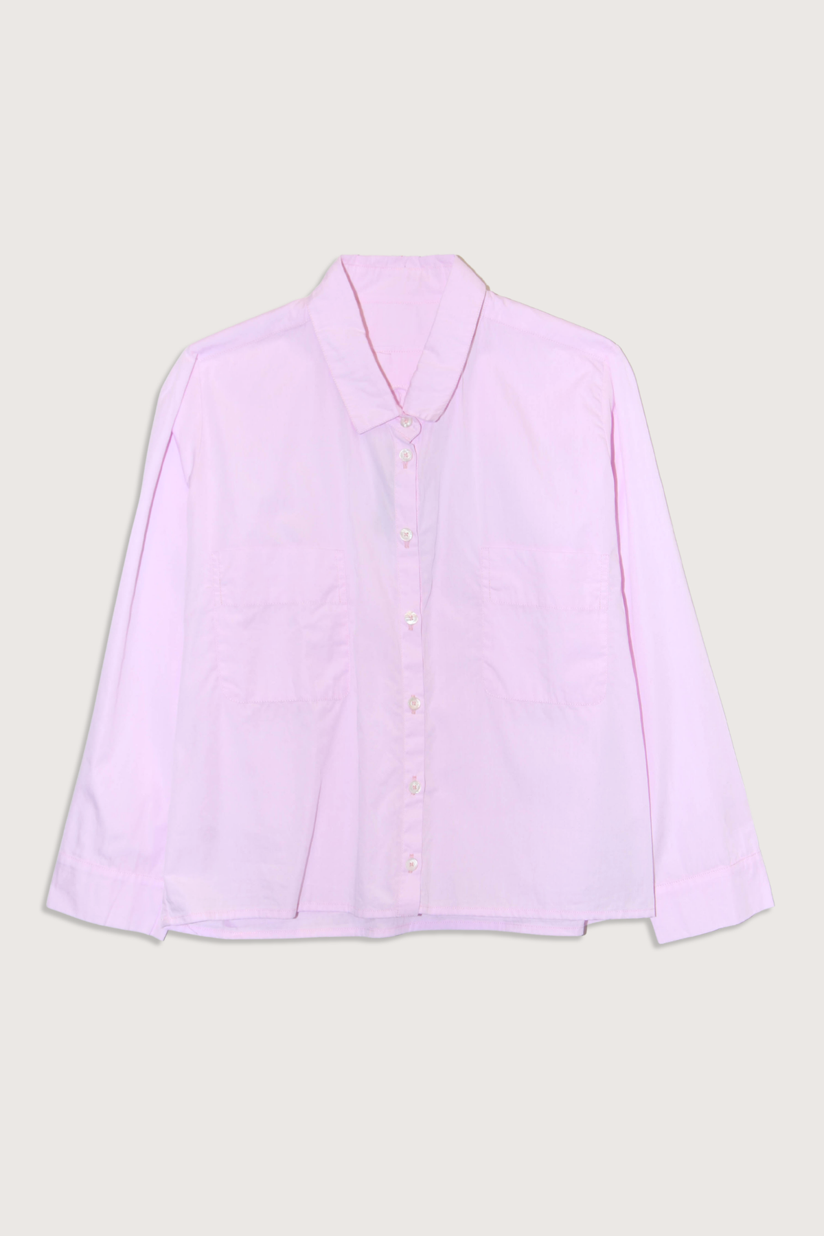 flat lay Cotton Crop Shirt With Pockets Candy pink
Front chest pocket
Button front closure
Classic collar