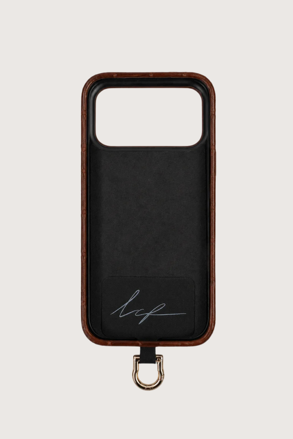 inside view of Croco Phone Case 17 Pro Max / 18 Pro Max Camel Croco Phone Case 17 Pro Max / 18 Pro Max Camel Protect your phone from dirt, scratches and shocks
High-quality materials
Sleek design
Non-slip surface
Includes universal adapter with gold metal
Lightweight and slim
Vegan leather