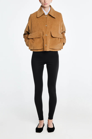front profile model wearing Cropped A-Line Cord Jacket caramel Two-way entry patch flap pockets at the front
Gently flared swing hem
Fastened with brushed German gold snaps
100% organic cotton Japanese corduroy