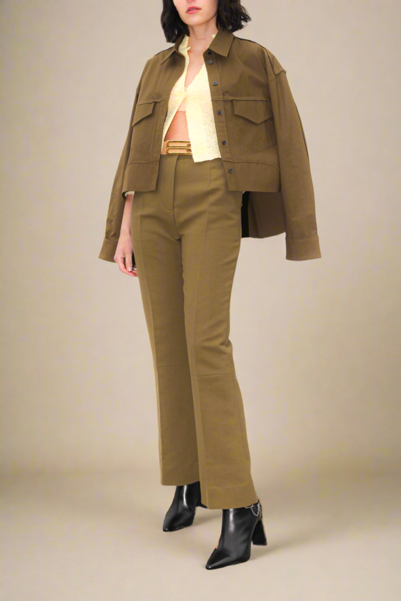 model wearing Cropped Kick fit Trouser Seaweed green with belt loops