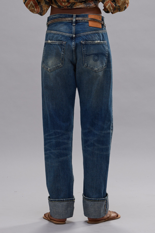 back profile model wearing Cuffed BF Jean Abyss selvedge blue Italian selvedge denim