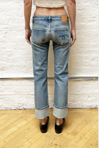 back profile model wearing  Cuffed Boy Straight Lapis Selvedge Blue Jean lapis blue mid wash Low rise
Slim straight
Cropped leg
Comfort stretch Japanese Selvedge Denim cotton