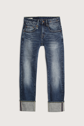 flat lay Cuffed Boy Straight Selvedge Blue Jean Low rise
Slim straight
Cropped leg
Comfort stretch Japanese selvedge indigo denim. 13 oz, 98/2
Dark indigo wash
Heavy wear pattern