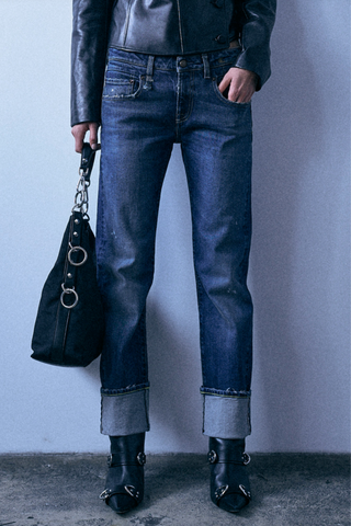 front profile model wearing Cuffed Boy Straight Stretch Jean dalson mid blue wash Slim straight fit
Low rise
Cropped leg
13 oz. comfort stretch Japanese selvedge indigo denim with a dark wash
Heavy wear pattern
98% Cotton 2% Elastane