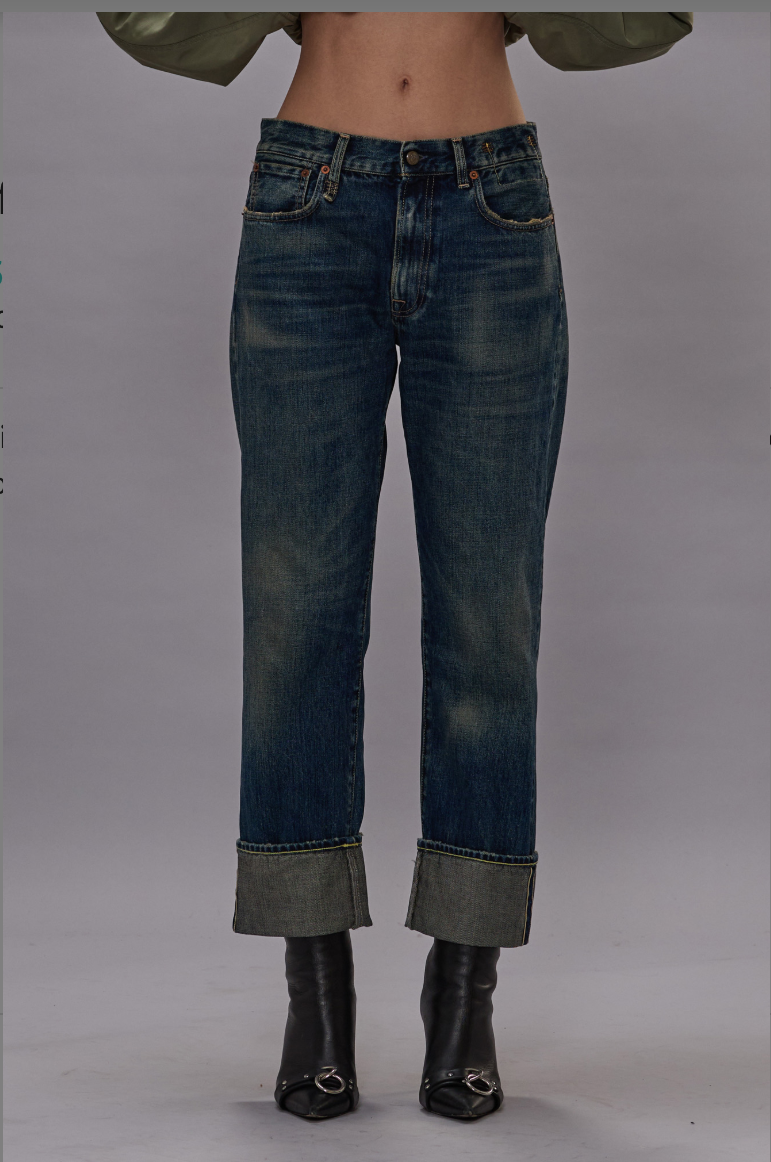 front profile model wearing Cuffed Boyfriend Selvedge Jean straight fit blue wash