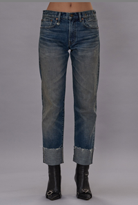 front profile model wearing Cuffed Romeo Selvedge Jean slim straight blue wash