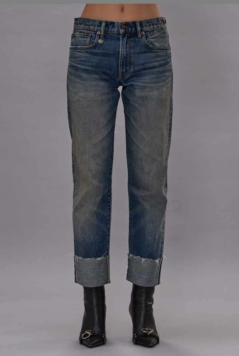 front profile model wearing Cuffed Romeo Selvedge Jean slim straight blue wash