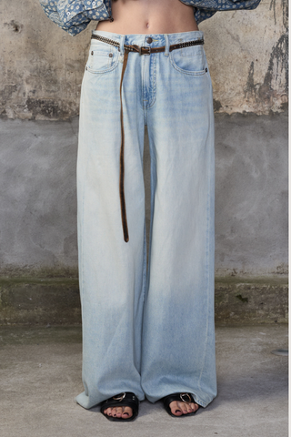 front profile model wearing  D'arcy Flare Jean lenon blue ight wash Relaxed wide leg
5 pocket jean
Flared leg
Japanese Rigid indigo denim cotton