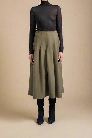 front profile model wearing Dakota Pleated Skirt mid-calf length