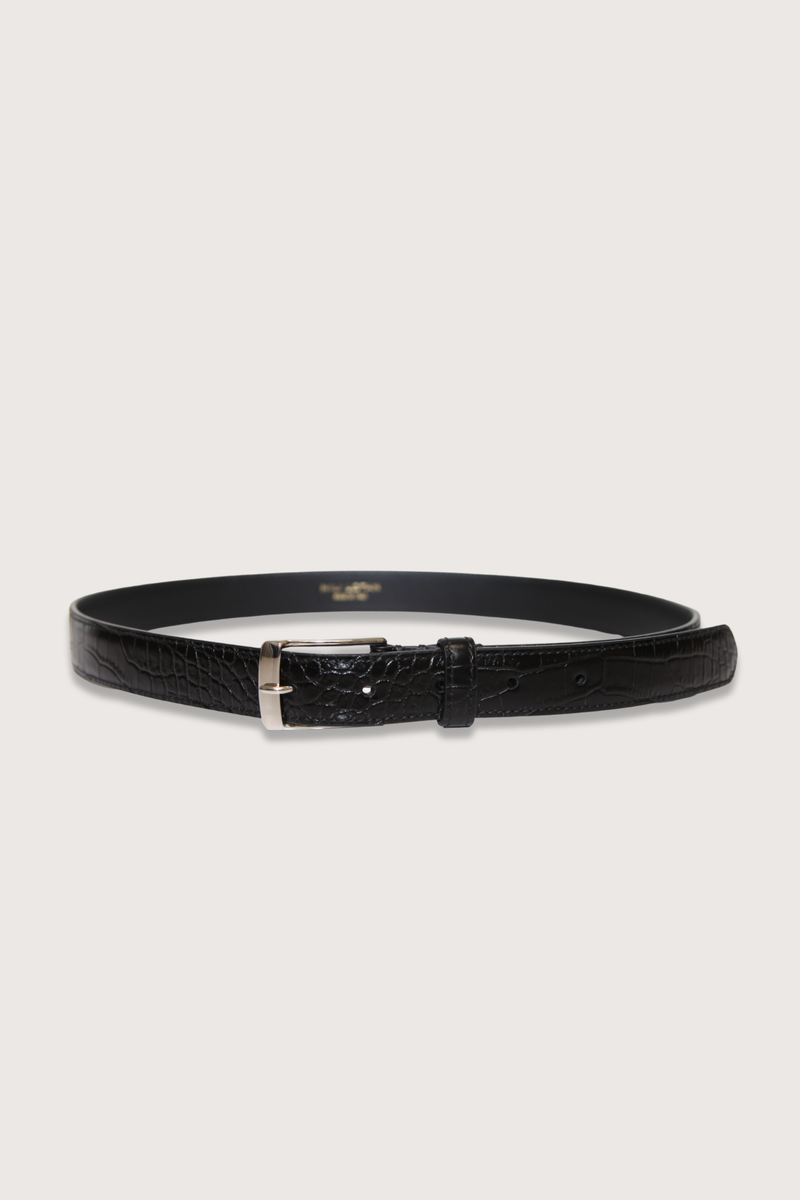 flat lay Dana Belt Black/Silver 25mm wide belt
Embossed croc
Italian leather
Leather keeper
Custom gold hardware finish
Italian hardware with engraved logo on the back
Lined in black contrasting leather