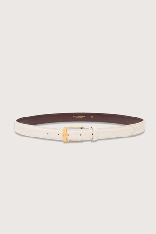 flat lay Dana Belt Ivory/Gold 25mm wide belt
Embossed croc
Italian leather
Leather keeper
Custom gold hardware finish
Italian hardware with engraved logo on the back
Lined in black contrasting leather