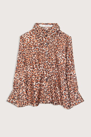 flat lay Dana Leopard Trek Silk Shirt medium brown and orange 100% Hand-loomed silk
Feather-light fabric
Leopard print
'70s dagger collar
Dramatic French cuffs: styled fastened or left undone