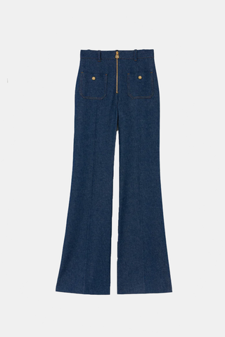 flat lay Danae High Waisted Flared denim Pants with front pockets and gold exposed zipper closure