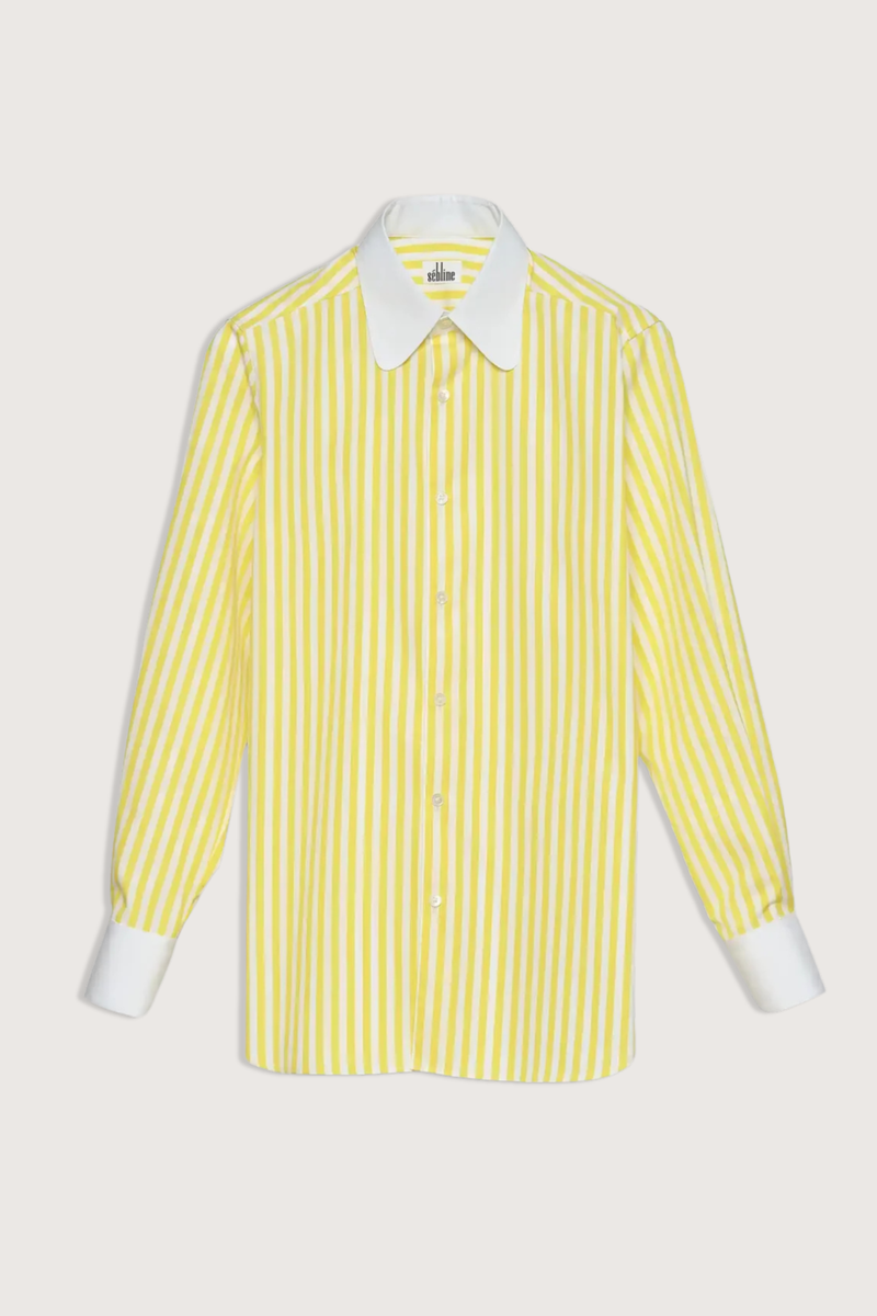 flat lay Dandy Shirt yellow white vertical stripe Exaggerated white curved collar set against bright yellow striped cotton poplin
Straight cut - classic fit
Back yoke with pleat
Round collar
Rounded cuff
Mother-of-pearl buttons
Medium weight cotton
100% two-ply cotton poplin woven in Italy