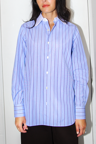 front profile model wearing Dandy cotton Shirt vertical blue stripe With White Collar curved tip with 