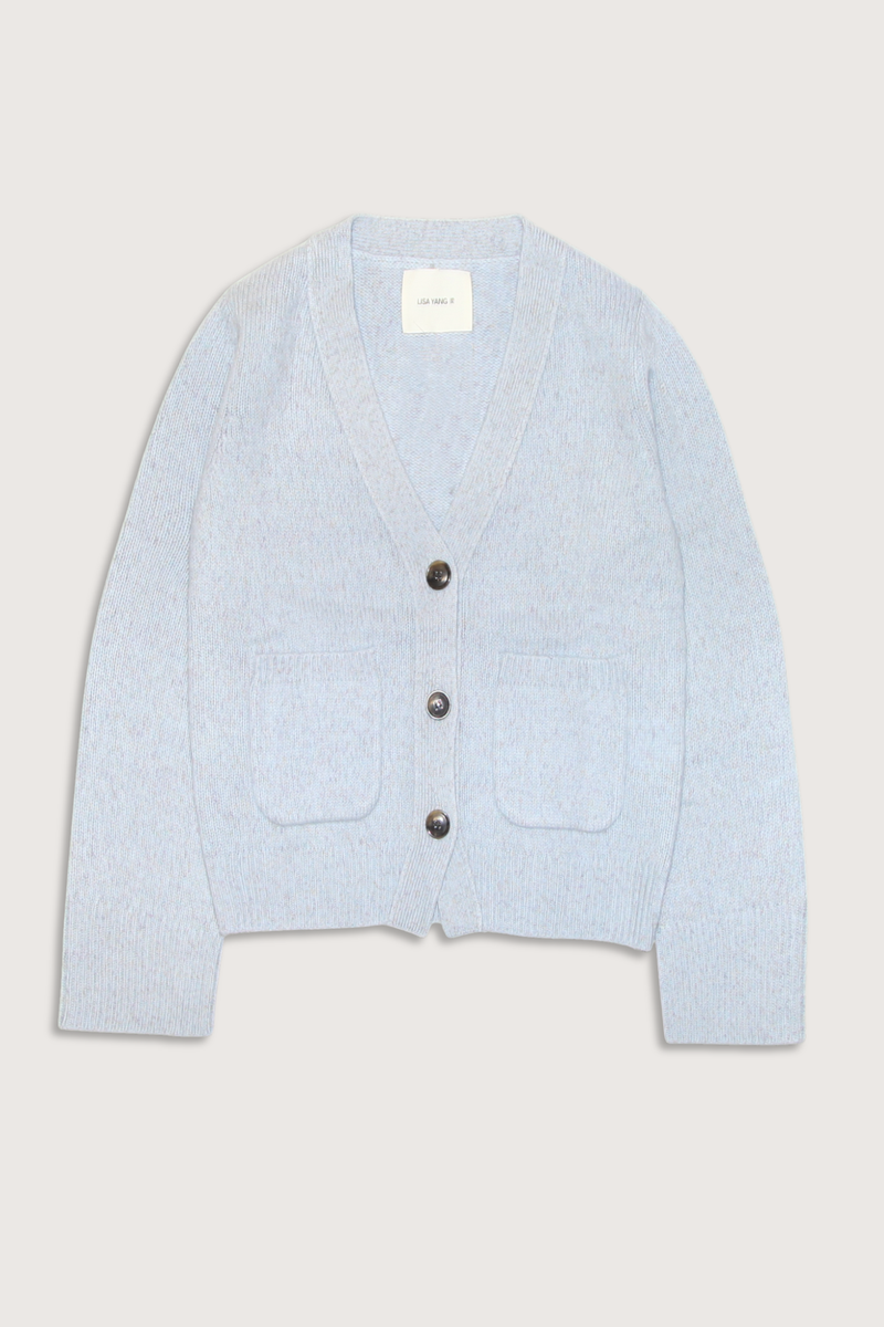 flat lay Danni Cashmere Cardigan Misty Blue Heavy knit cashmere
Relaxed fit
Deep v-neckline
Dropped shoulders
Straight wide sleeves
Patch pockets
Ribbed trims