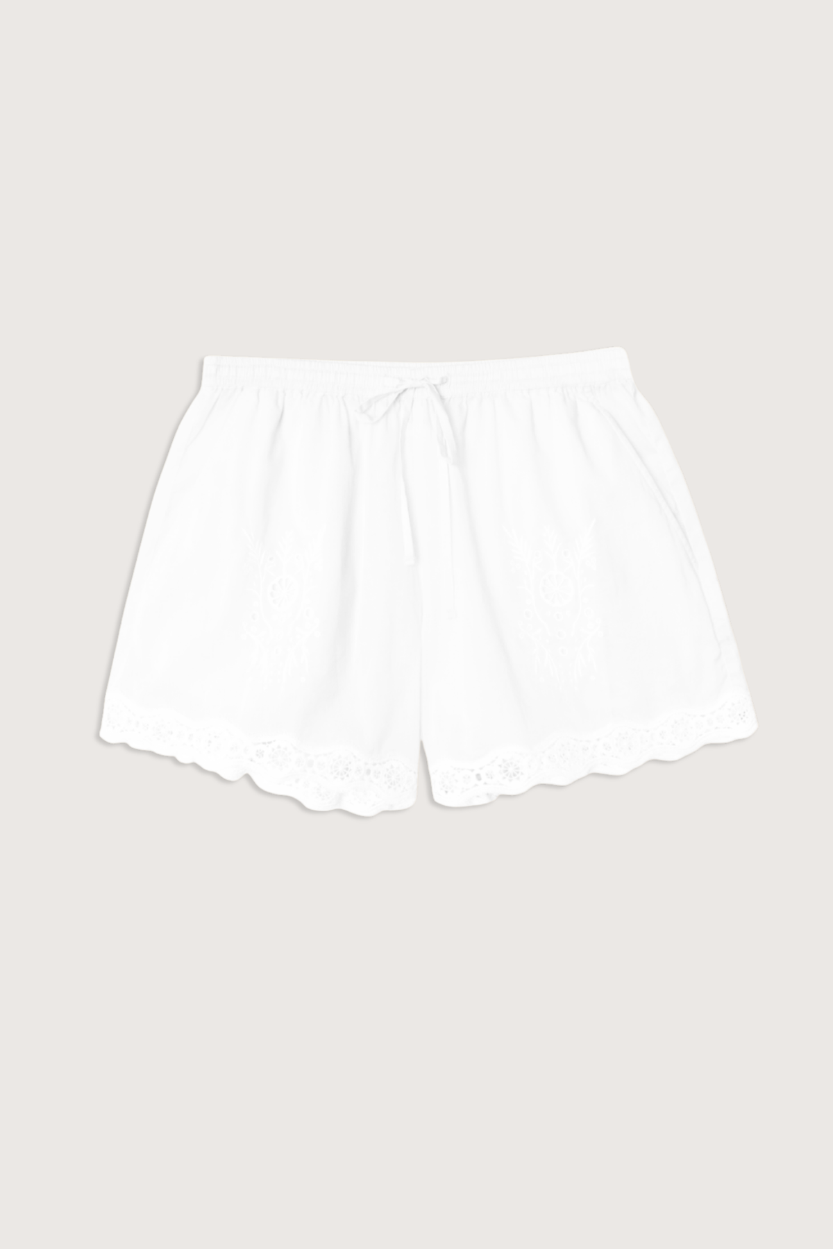 flat lay Danny Short white Superfine cotton voile
Airy shorts
Elasticized drawstring waist
Eyelet insets
Side seam
Back patch pockets
Lace-trimmed hem
Calista Cotton
100% Cotton