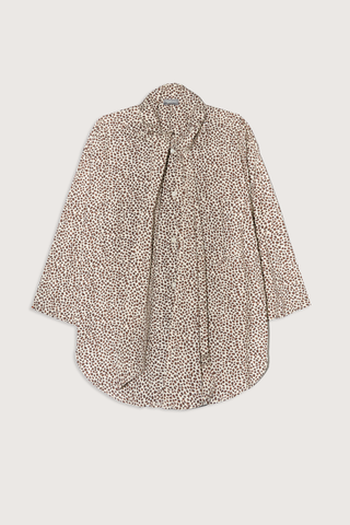 flat lay Dear Polly With Tie Shirt cheetah print Button front
Long neck ties: keep them loose or tie them off kilter in a sloppy bow.
Two front pockets and long-ish shaped hemline 
100% Cotton Poplin