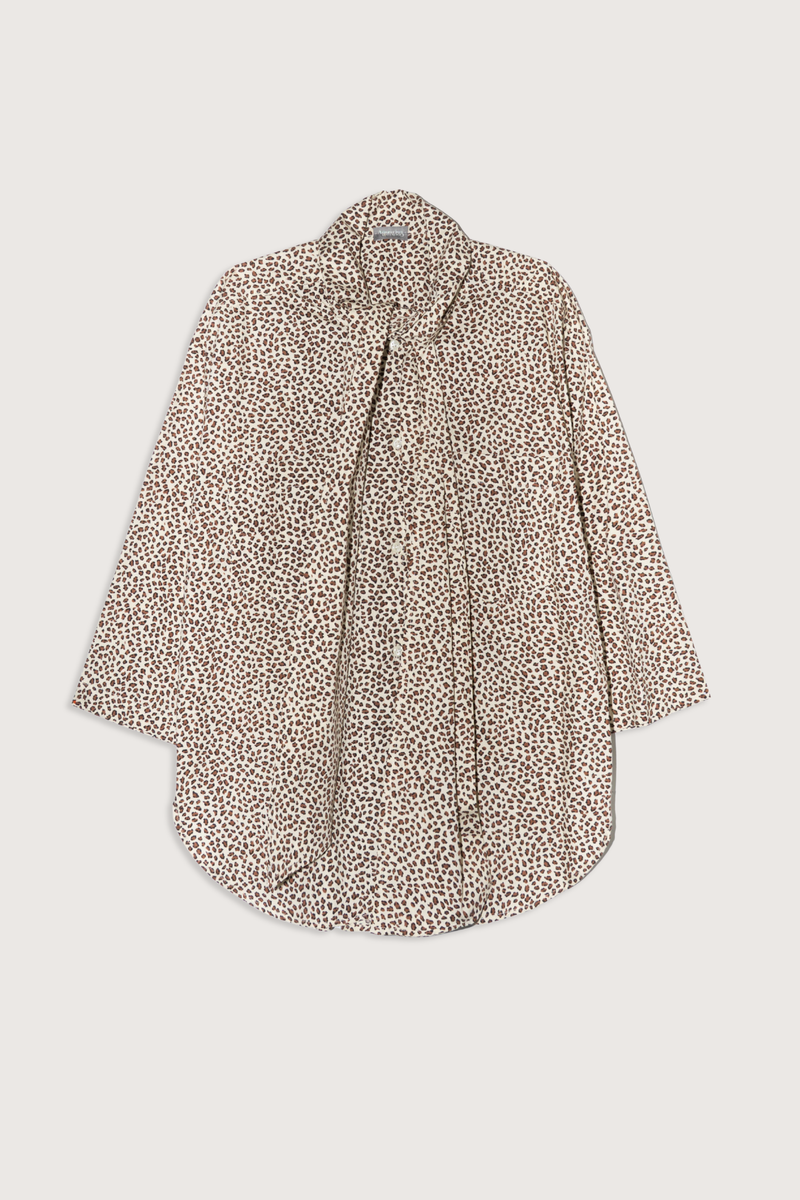 flat lay Dear Polly With Tie Shirt cheetah print Button front
Long neck ties: keep them loose or tie them off kilter in a sloppy bow.
Two front pockets and long-ish shaped hemline 
100% Cotton Poplin