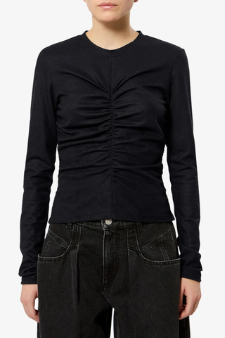 front profile model wearing Delesa Ruched Flannel Jersey Top black Ruched top in solid flannel jersey
Fitted silhouette
Ruching at the front and back
Round neckline
Long sleeves
Polyester 66% Wool 29% Elastane 5%