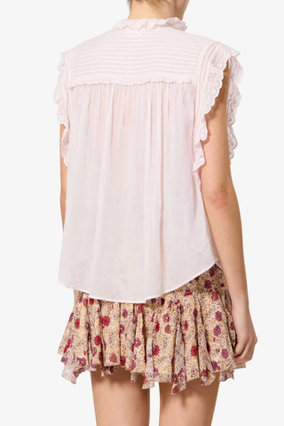 back profile model wearing Dersia Sleeveless Embroidered Top Light Pink cotton voile
Straight fit
Front button closure
Pleated and embroidered bib
High round neckline with embroidered ruffle
Pleated shoulders
Ruffled armholes
Curved hem
100% Cotton
