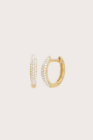 flat lay Diamond Dome Huggie  Earring (Pair) yellow gold 
.20 carats of pavé diamonds

Outer diameter: 12 mm
Inner diameter: 10 mm
Huggie width at widest point: 2.5 mm
Finished with a latch closure