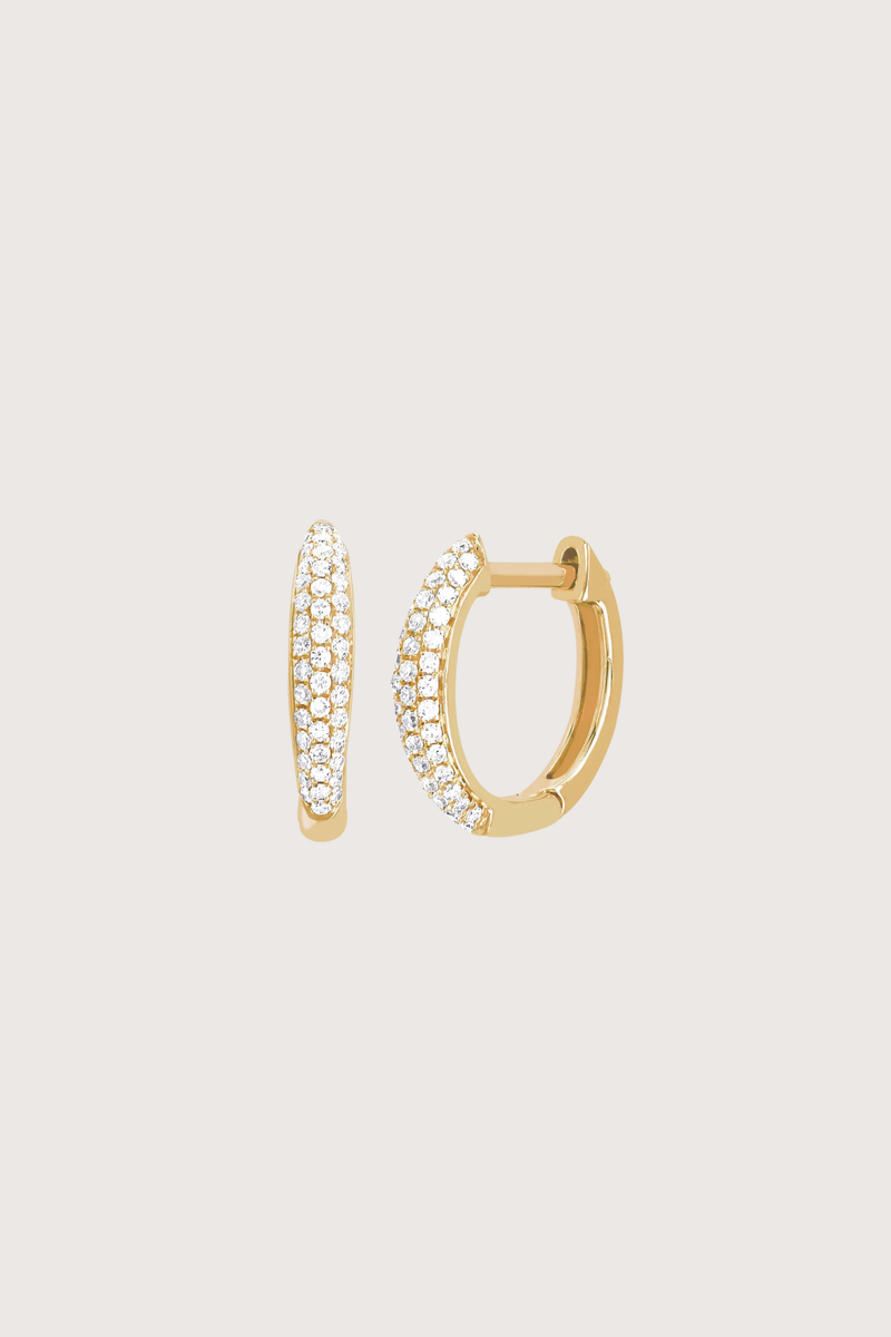 flat lay Diamond Dome Huggie  Earring (Pair) yellow gold 
.20 carats of pavé diamonds

Outer diameter: 12 mm
Inner diameter: 10 mm
Huggie width at widest point: 2.5 mm
Finished with a latch closure