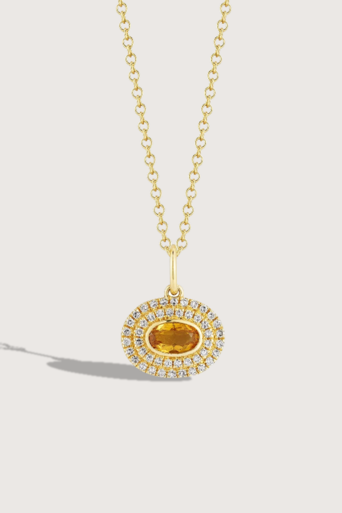 flat lay Diamond & Oval Citrine Gem Necklace 14k gold