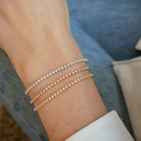 model wearing Diamond Segment Mini Link Bracelet 14k Yellow Gold