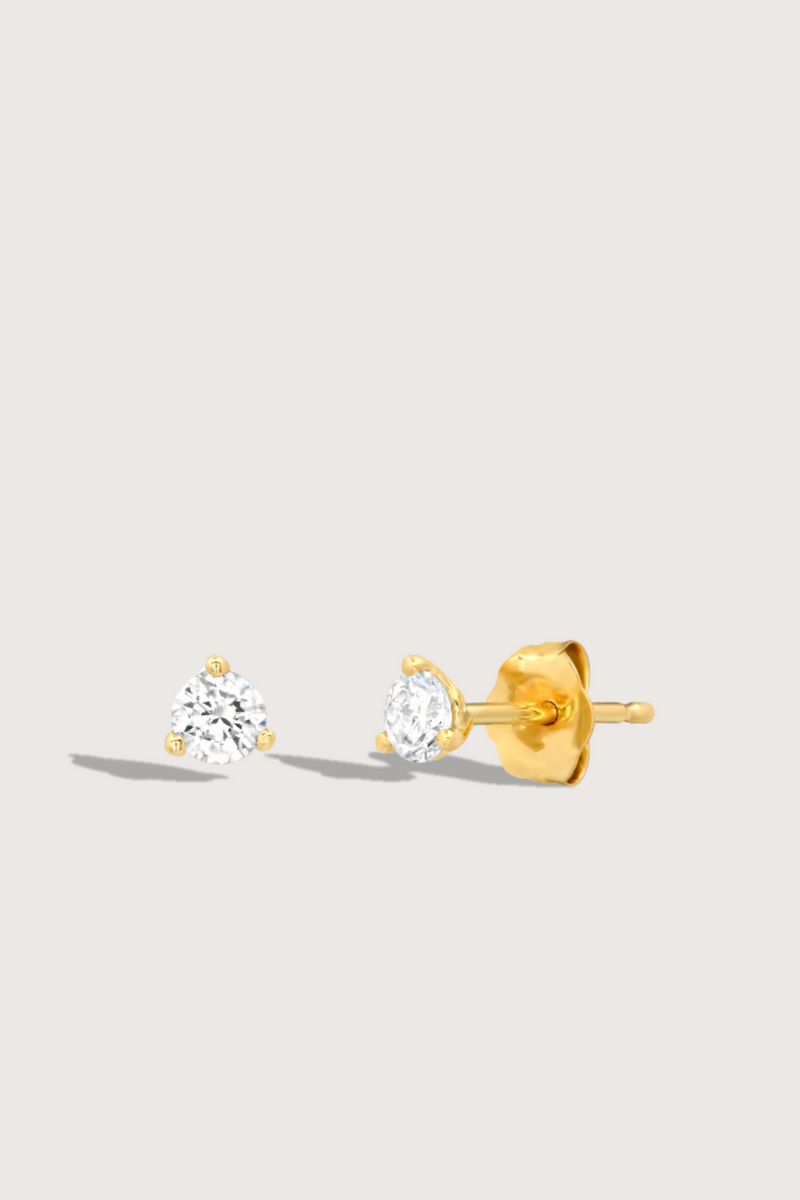 flat lay Diamond Studs 14k gold