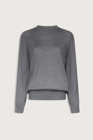 flat lay Ditto Fine Cashmere Long Sleeve Crew Sweater Anthracite grey Ample fit
Adjusted around the hips
Drop shoulders
Crew neck
Ribbed details on the collar, hem and cuffs
100% CASHMERE