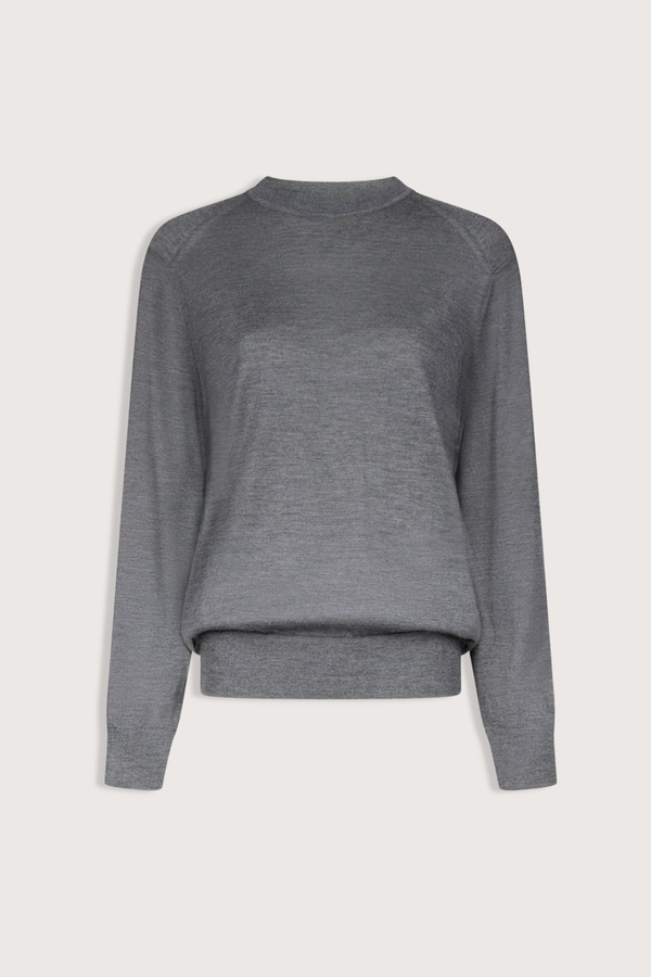 flat lay Ditto Fine Cashmere Long Sleeve Crew Sweater Anthracite grey Ample fit
Adjusted around the hips
Drop shoulders
Crew neck
Ribbed details on the collar, hem and cuffs
100% CASHMERE
