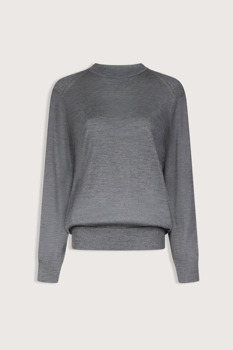 flat lay Ditto Fine Cashmere Long Sleeve Crew Sweater Anthracite grey Ample fit
Adjusted around the hips
Drop shoulders
Crew neck
Ribbed details on the collar, hem and cuffs
100% CASHMERE