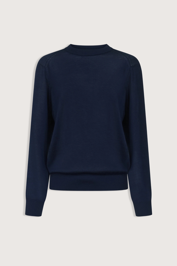 flat lay Ditto Fine Cashmere Long Sleeve Crew Sweater Navy Ample fit
Adjusted around the hips
Drop shoulders
Crew neck
Ribbed details on the collar, hem and cuffs
100% CASHMERE
