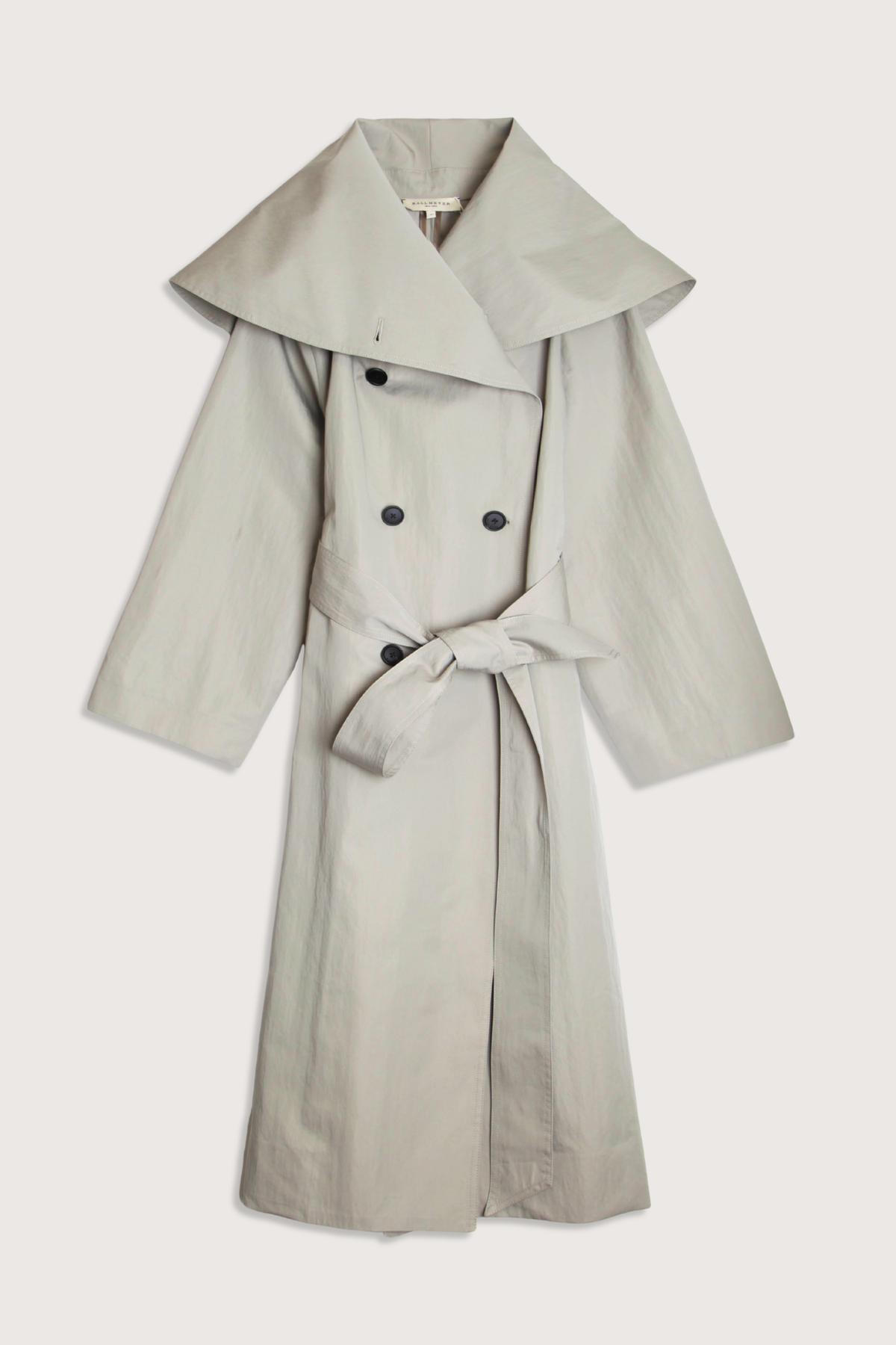 flat lay Dorothy Trench Coat fog grey 
Dramatic oversized shawl collar drapes across the shoulders 
Double breasted closure with contrast buttons and self tie belt at the waist
Welt pockets at front
 dropped shoulders and bracelet length sleeves mid calf length cotton nylon blend