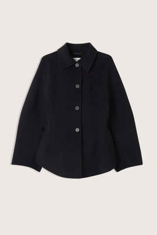 flat lay Double Faced Sculptural Jacket Black
Cinched waist
Oversized sculptural sleeves
Four button closures
Side-seam welt pockets
Subtle front and back darts
95% wool 5% cashmere