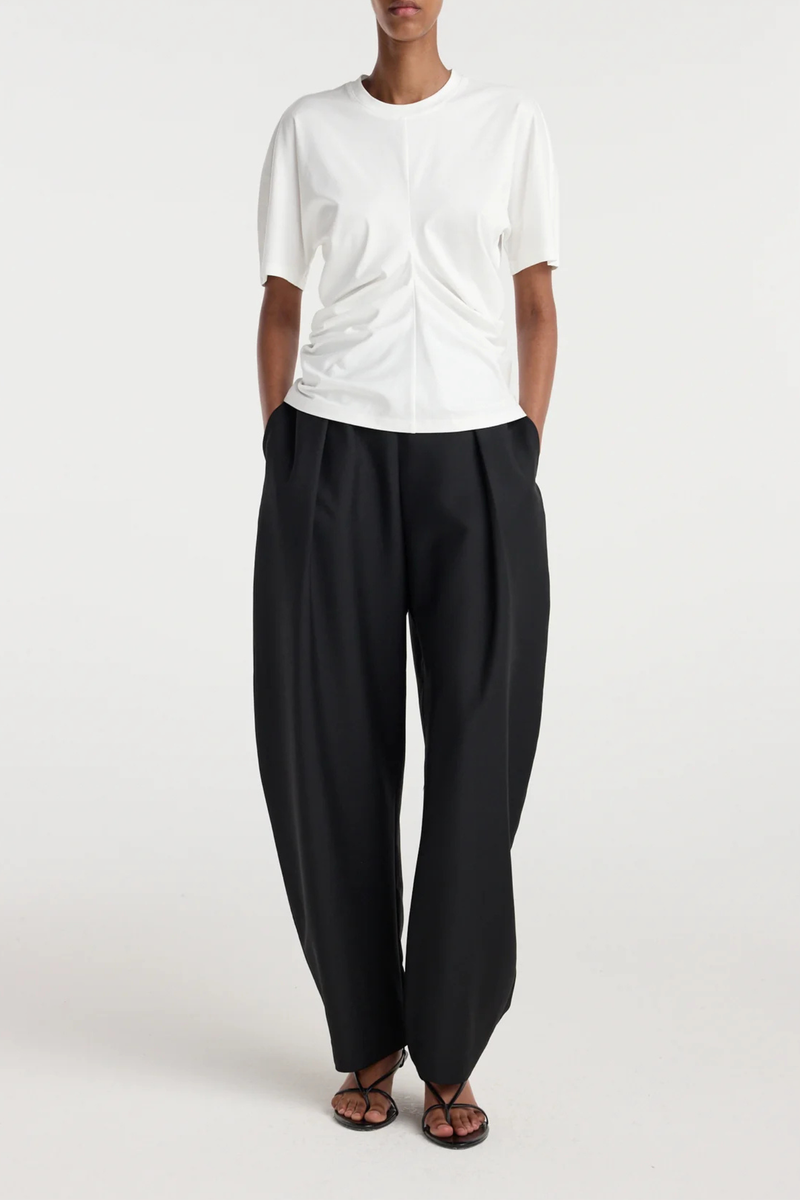 front profile model wearing  Draped Short Sleeve T-Shirt White Seam detailing down the front brings the fabric together and creates draping throughout the garment
Short sleeve t-shirt
60% cotton 34% modal 6% silk