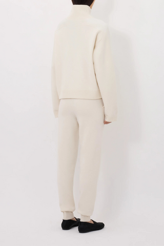 back profile model wearing Dries Stand Collar French Terry ivory cashmere stand collar front zip