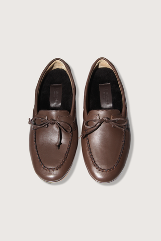 top profile Driver Moccasin Shearling lined chocolate calf leather thin rubber sole with leather tie front